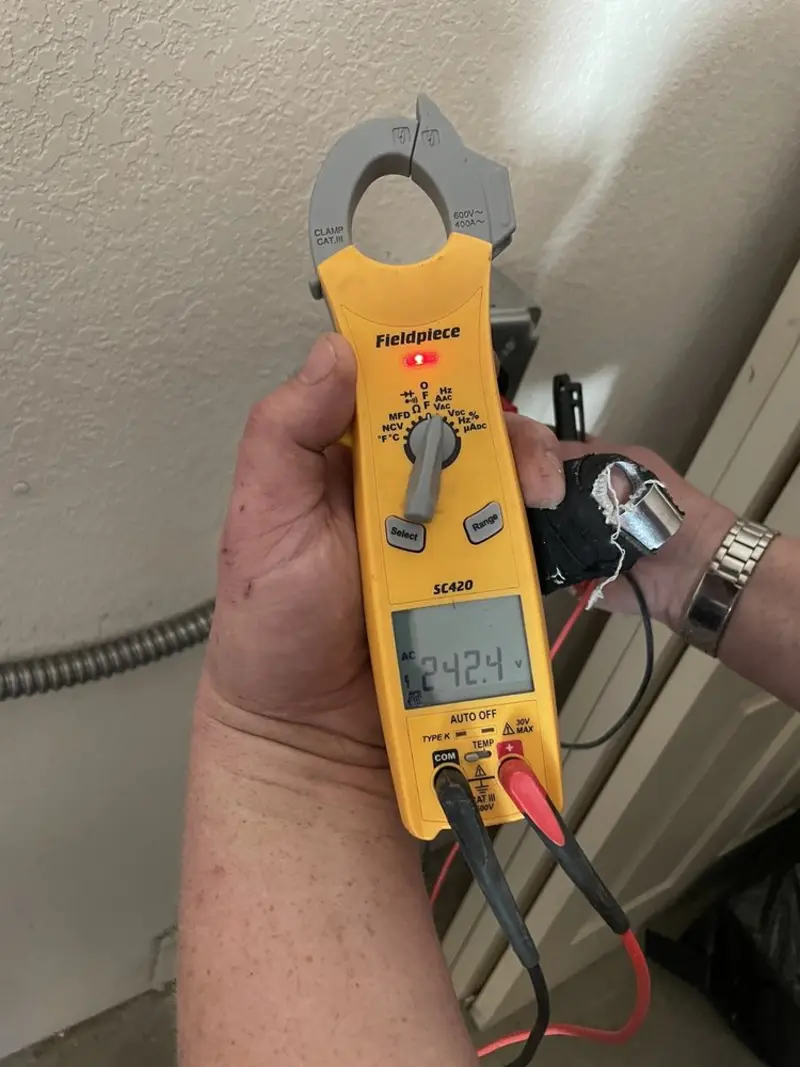 Voltage testing with clamp meter during Generator Installation in New Hampton